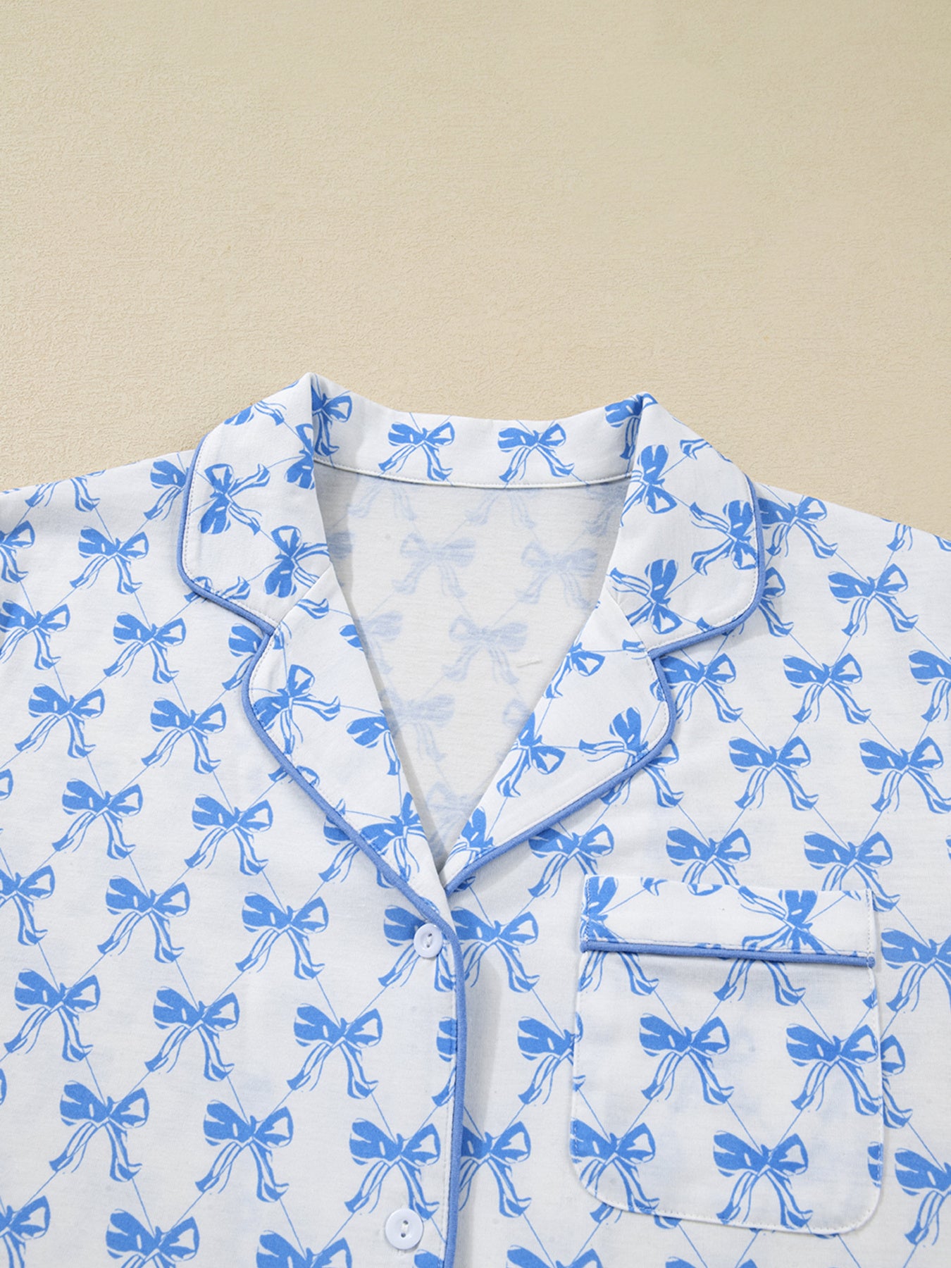 Light blue bow print long sleeve pajama top and matching pants