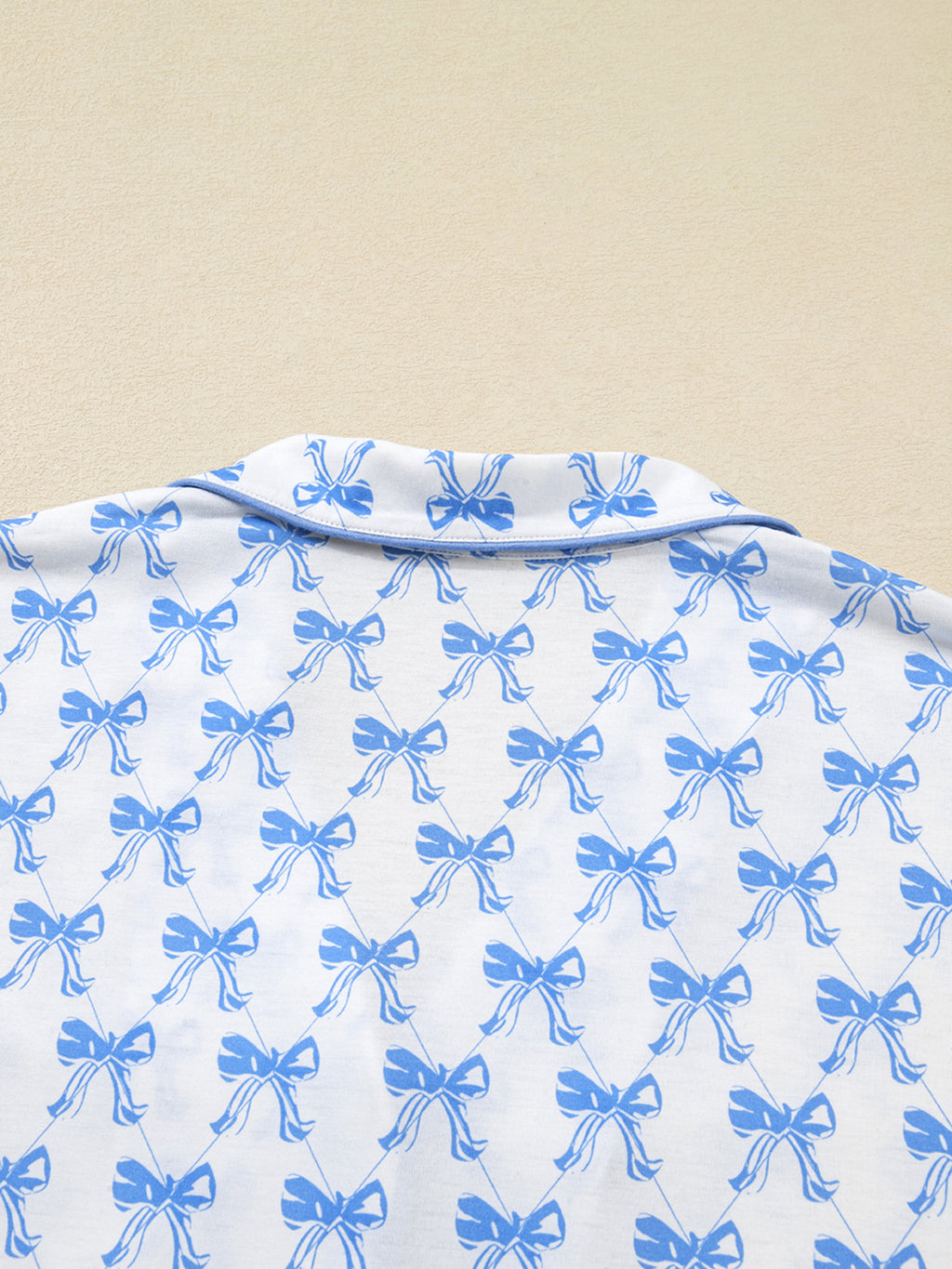 Light blue bow print long sleeve pajama top and matching pants