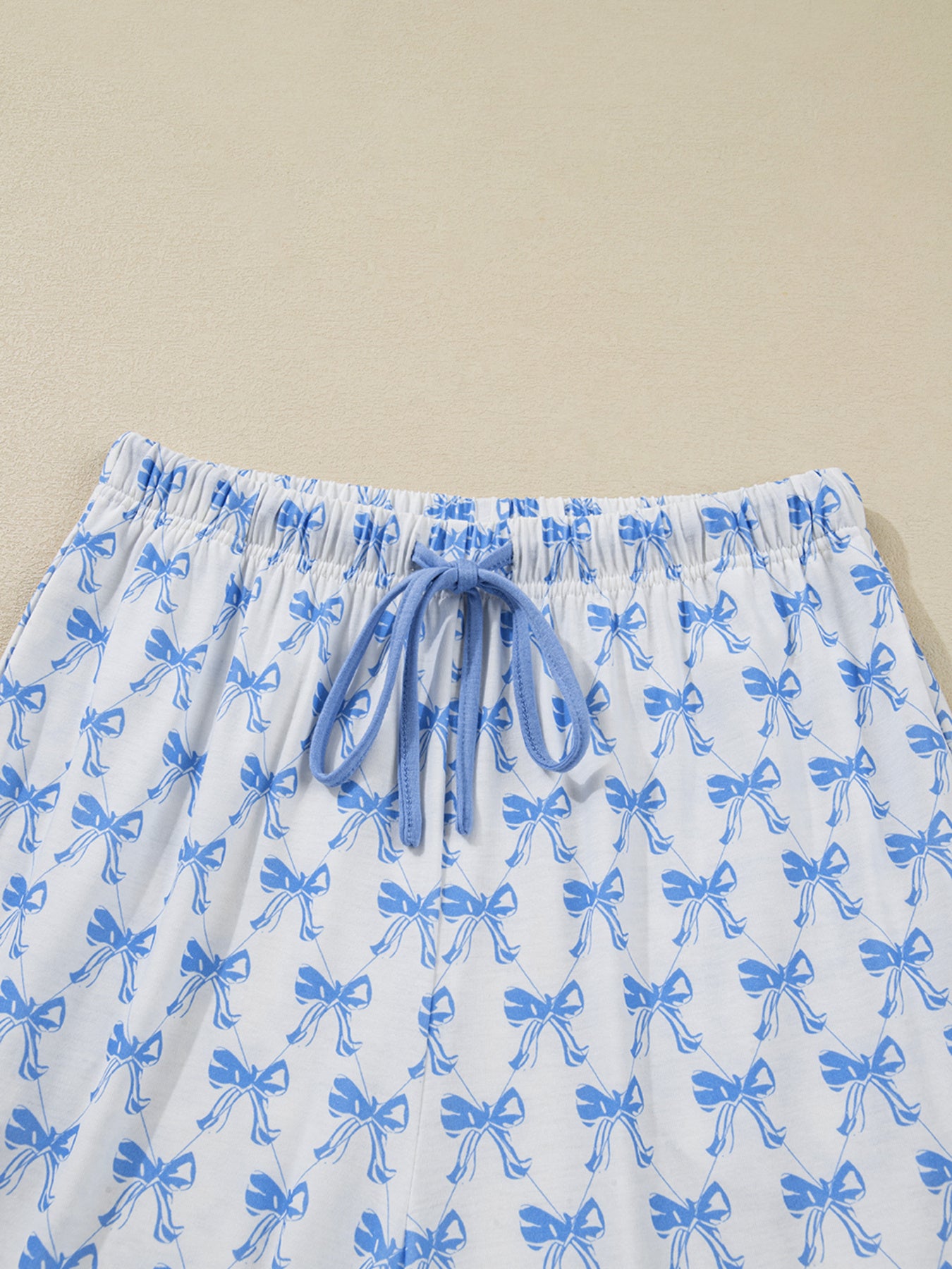 Light blue bow print long sleeve pajama top and matching pants