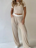 Beige contrast trim crop top and wide-leg pants set, front view
