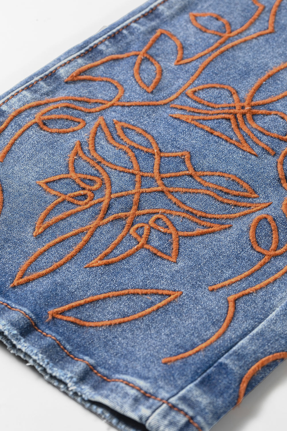 Embroidered flare leg jeans, medium wash