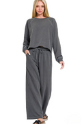 Washed french terry pullover and wide-leg pants set in black, full front view