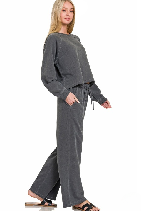 Washed french terry pullover and wide-leg pants set in black, full front view