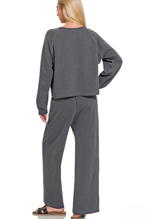 Washed french terry pullover and wide-leg pants set in black, full front view