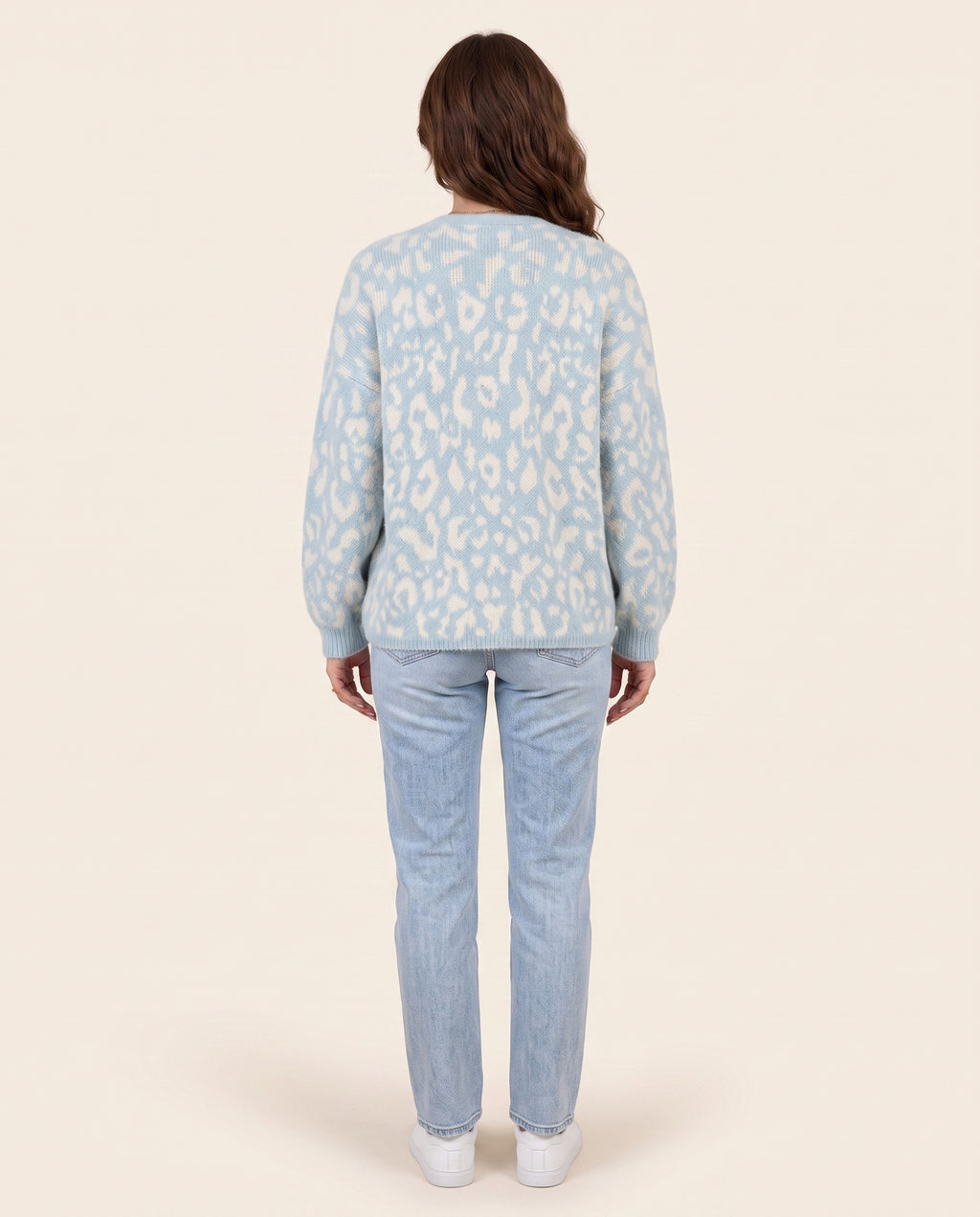Light blue leopard print v neck cardigan, back view