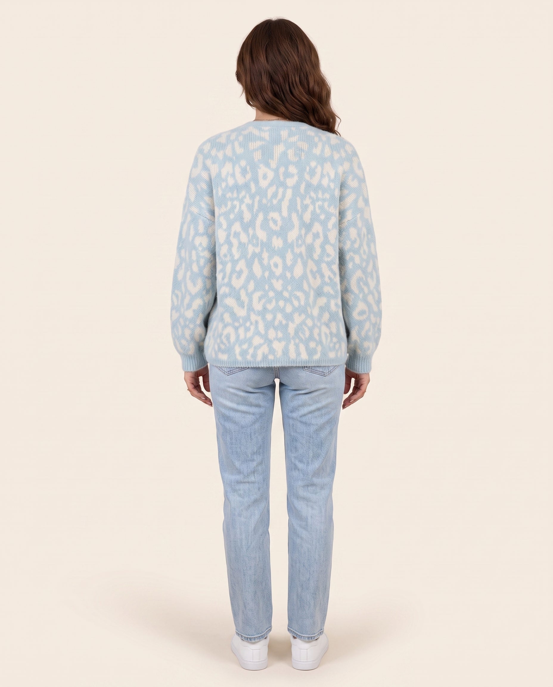 Light blue leopard print v neck cardigan, back view