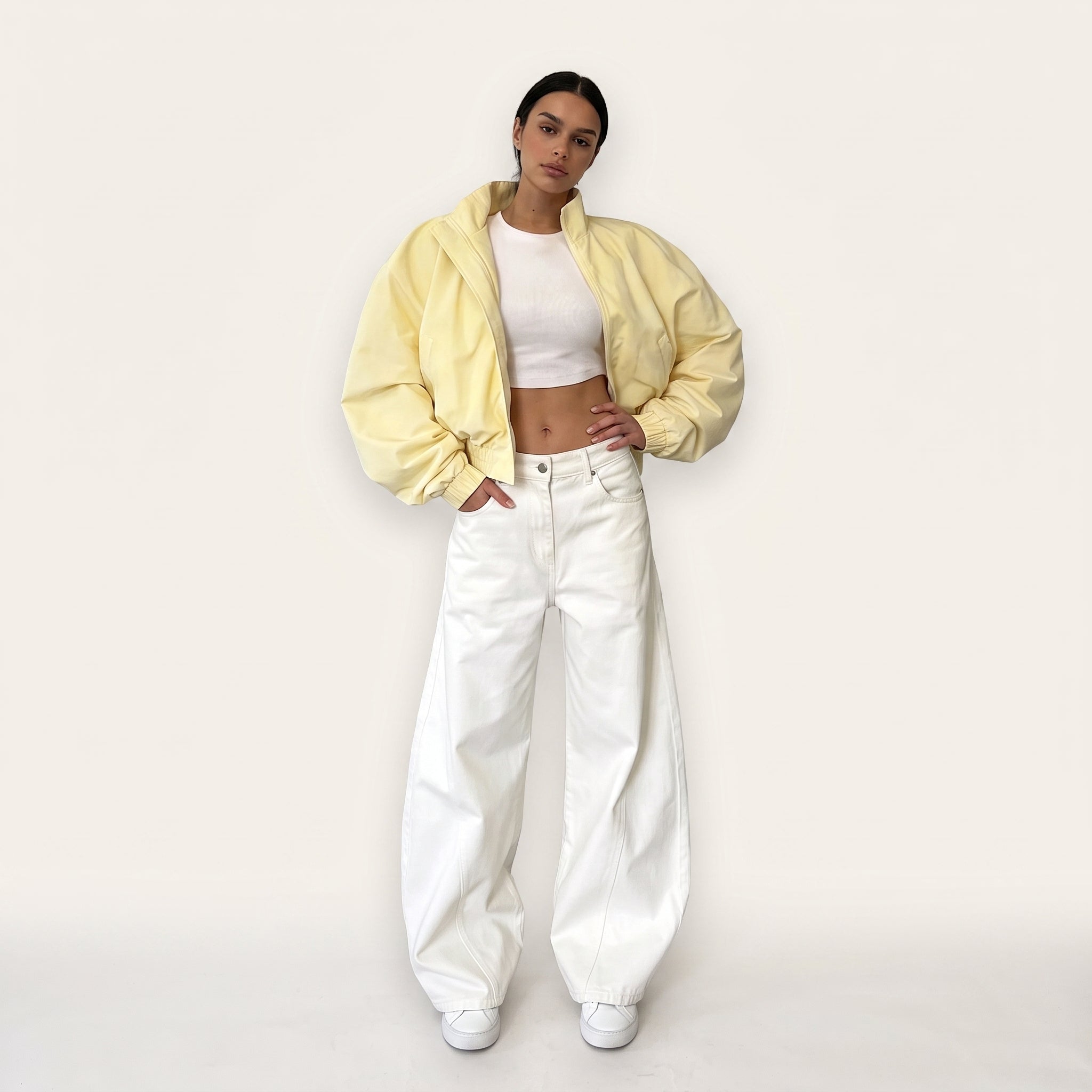 Pastel yellow oversized bomber jacket, front view