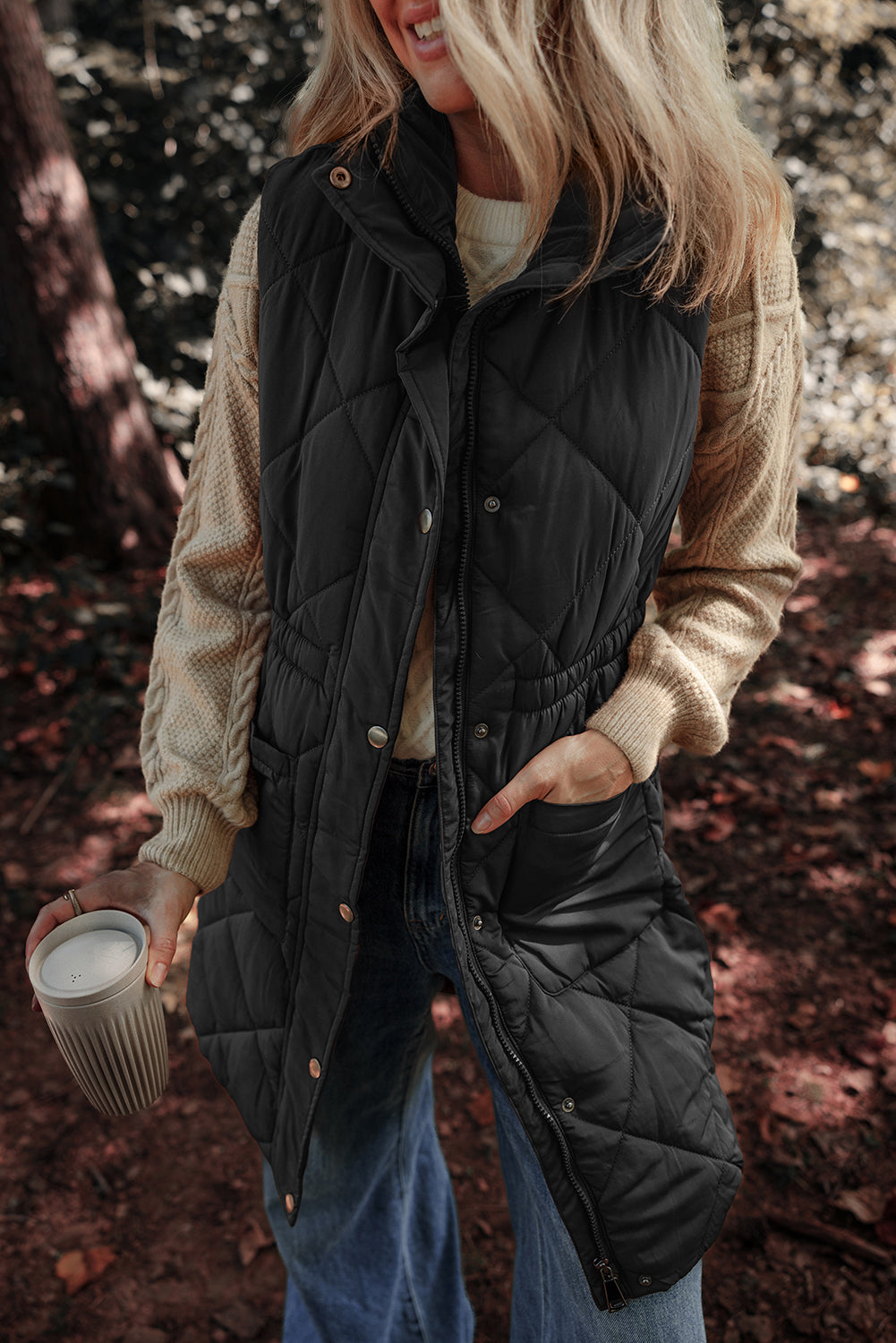 Black quilted zip vest coat