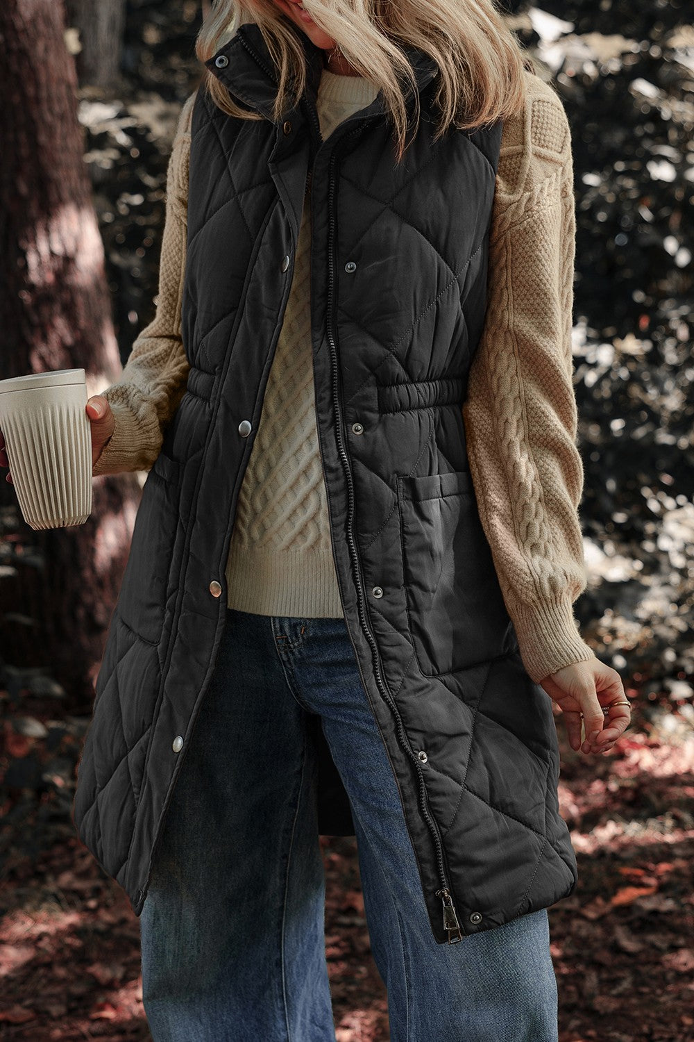 Black quilted zip vest coat