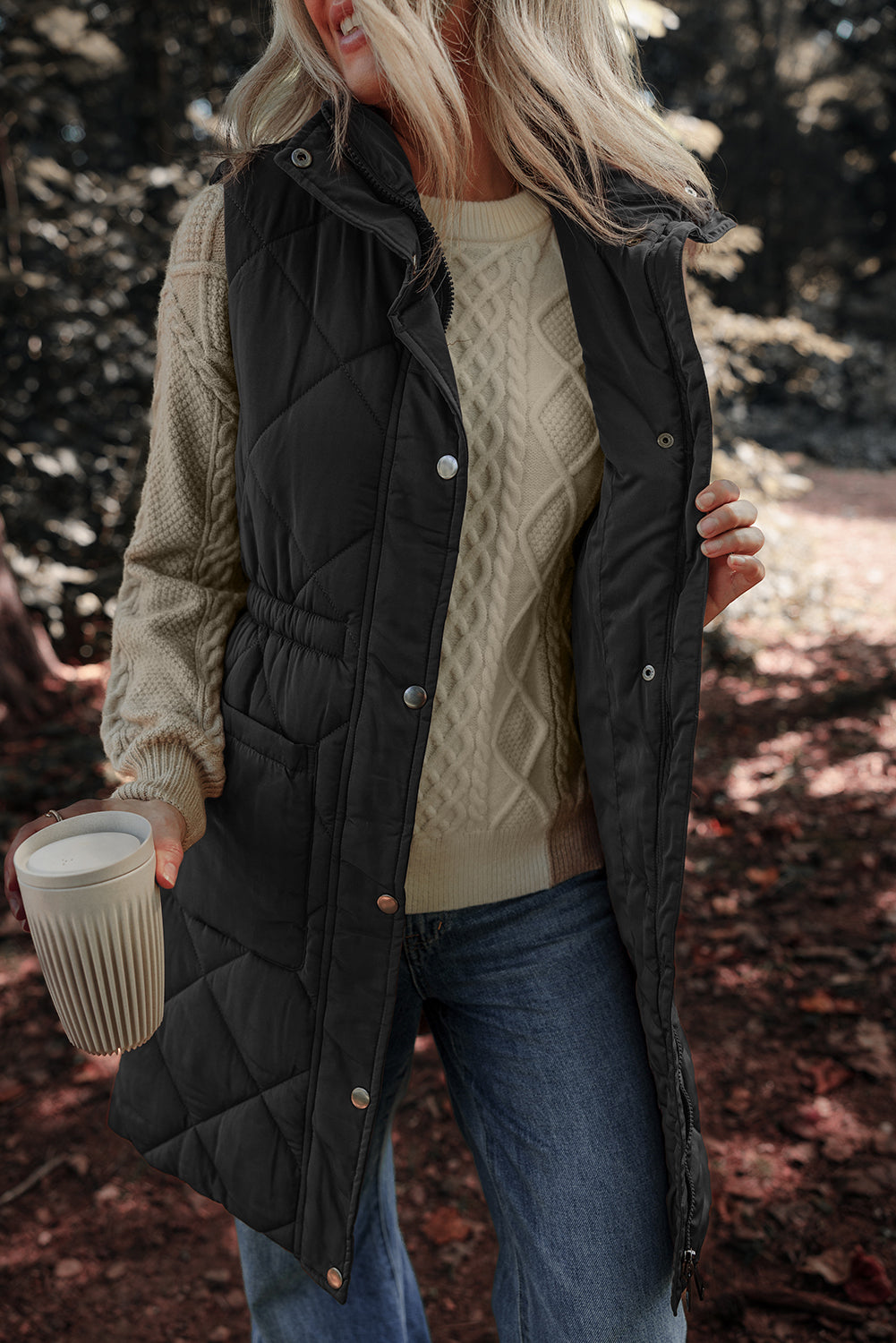 Black quilted zip vest coat
