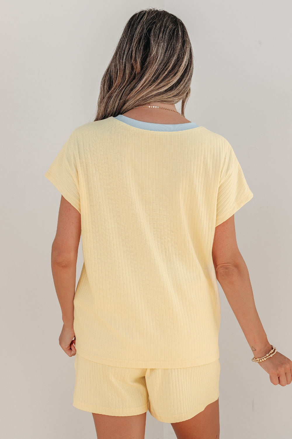 Pastel yellow ribbed short set, back view