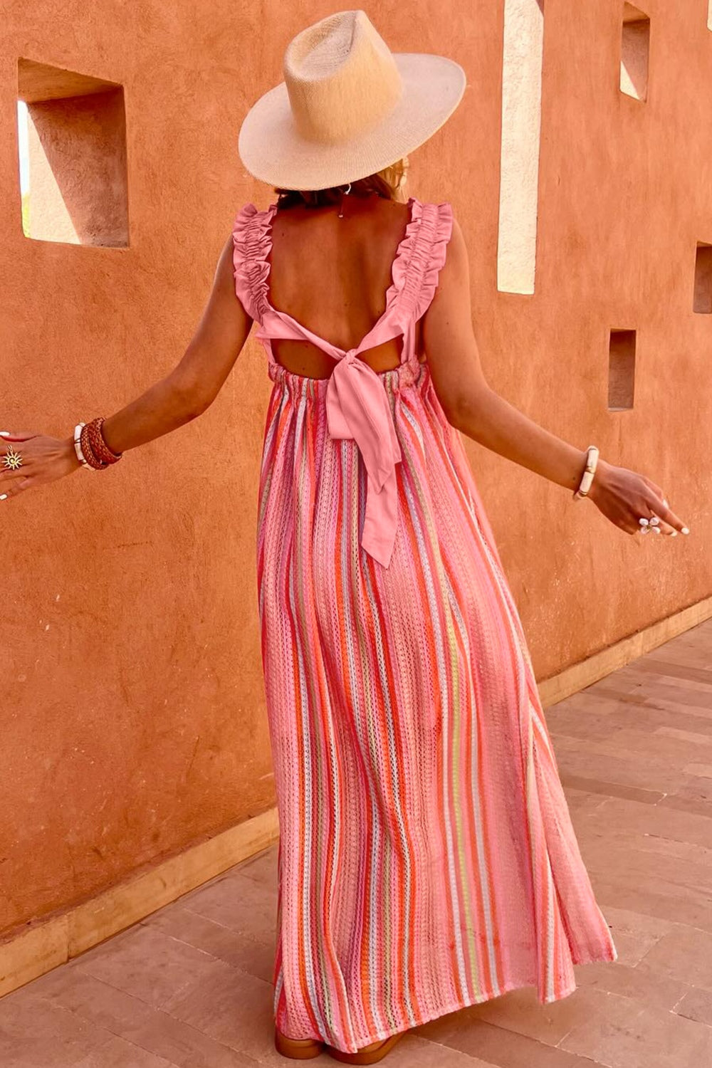 Ruffled ribbon knot spaghetti strap maxi dress in pink, back view