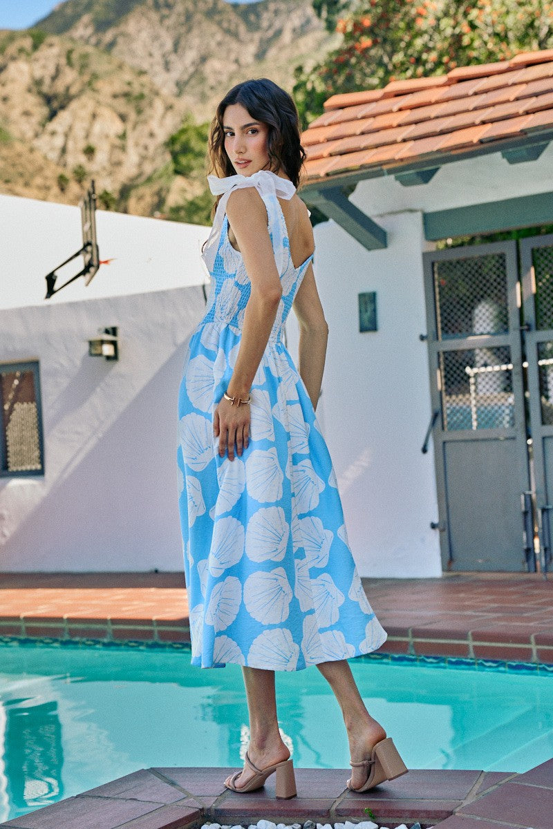 Blue shell print smocked midi dress - back view