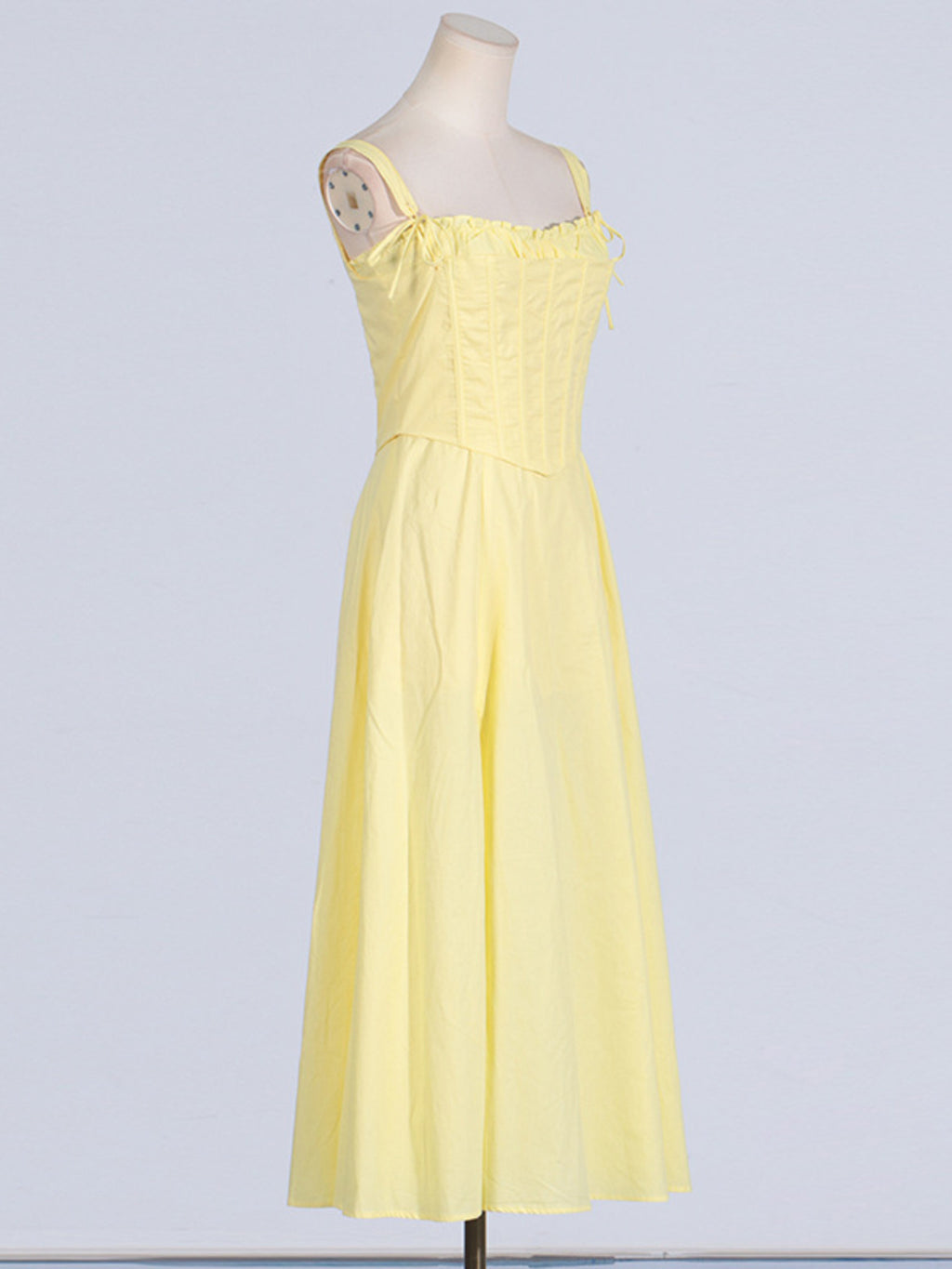 Yellow slit sleeveless midi dress with corset bodice