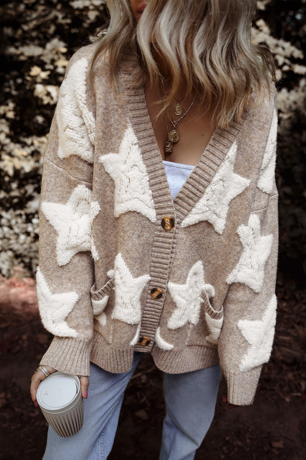 Mocha cardigan with cream star pattern and button-up front, long sleeves
