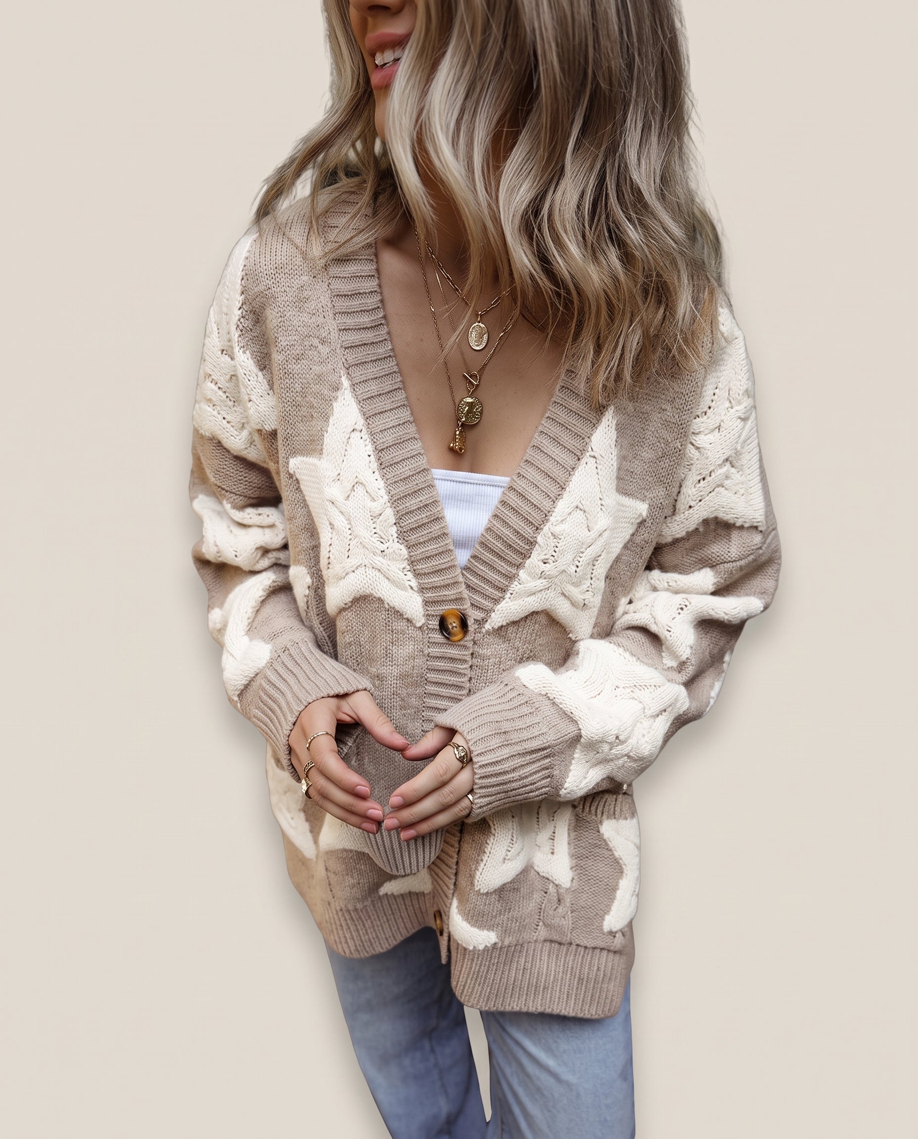 Mocha cardigan with cream star pattern and button-up front, long sleeves