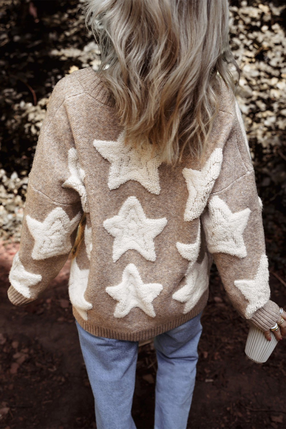Mocha cardigan with cream star pattern and button-up front, long sleeves