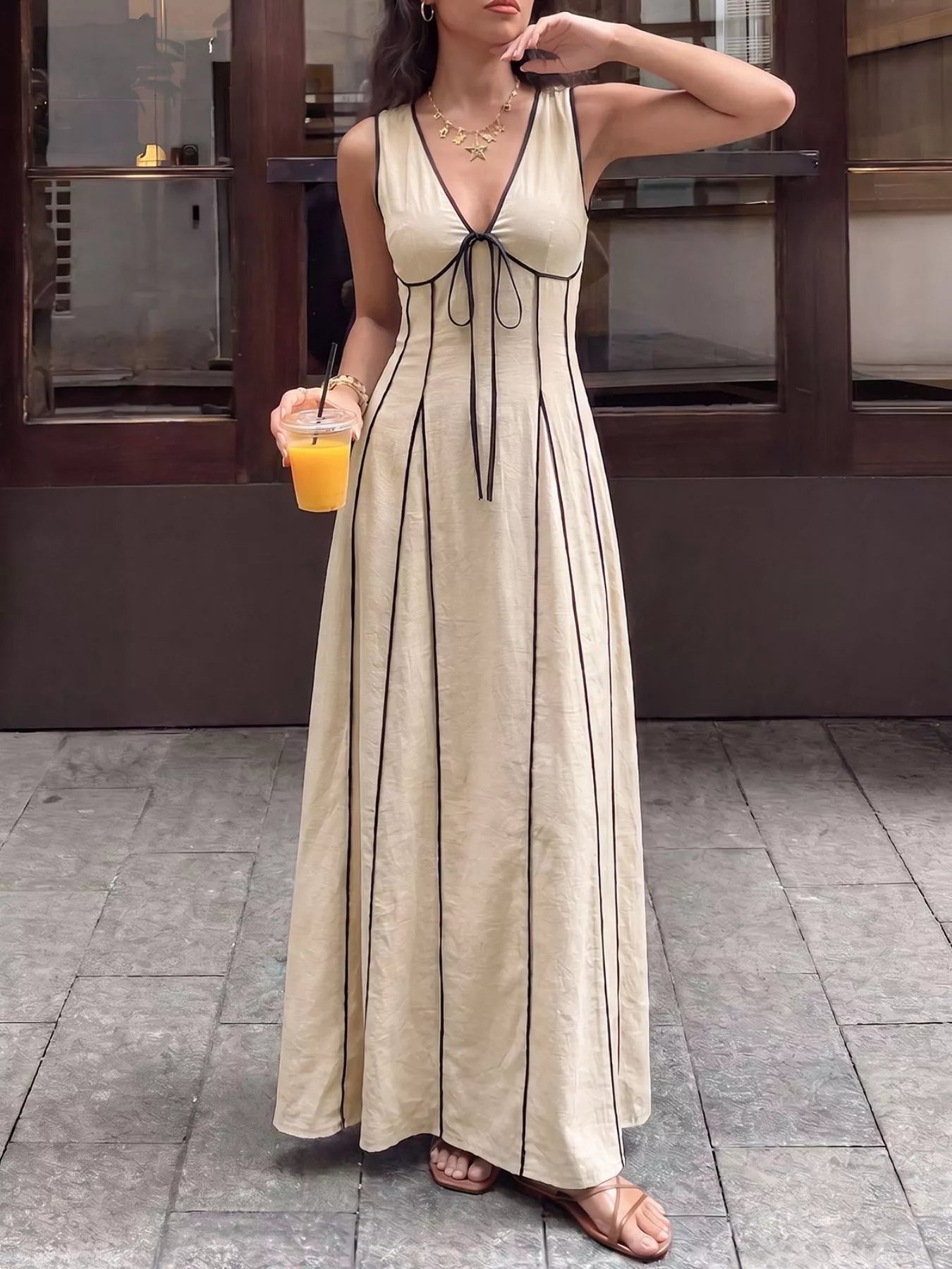 V-neck sleeveless maxi dress in tan, front view