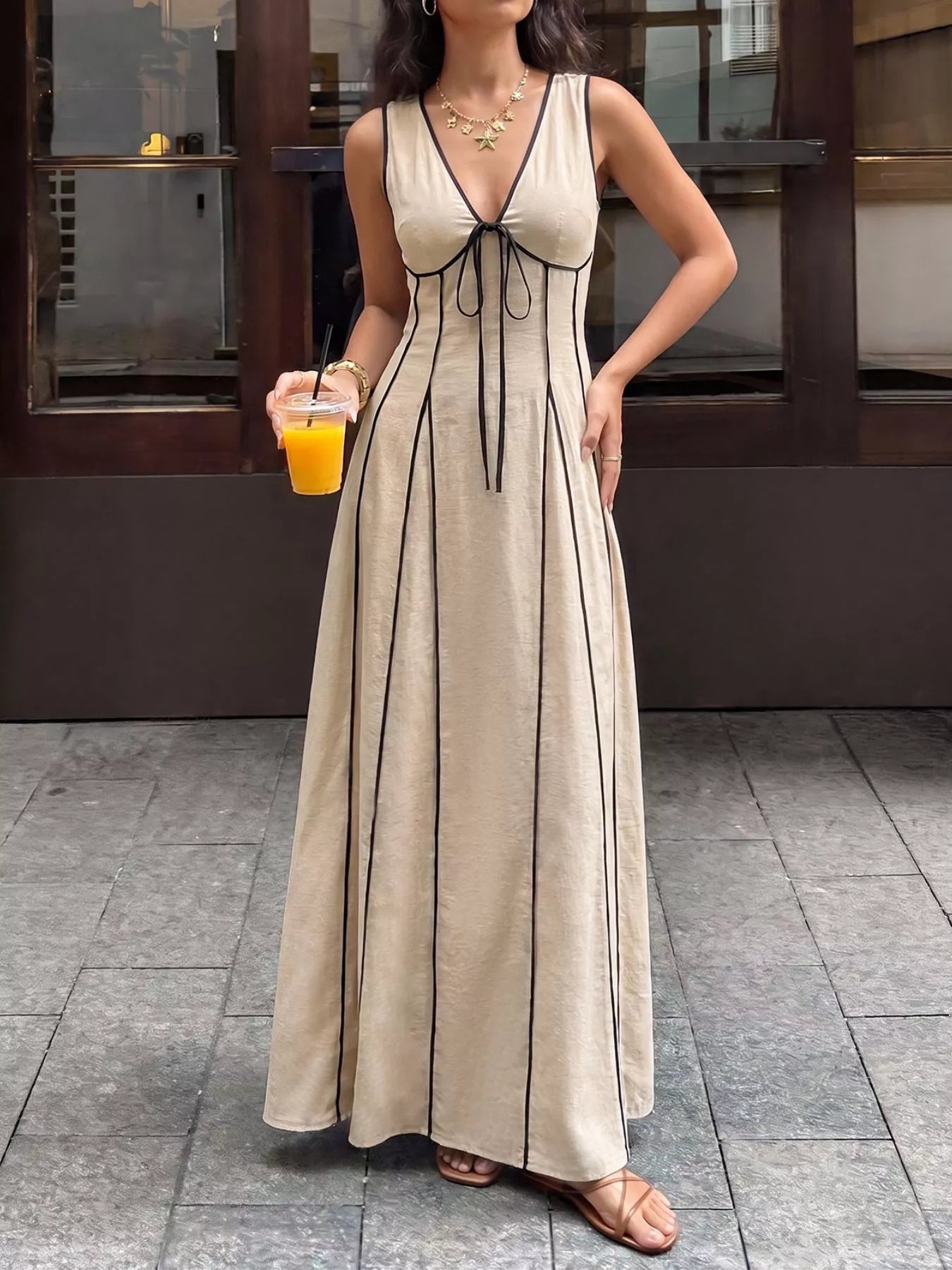 V-neck sleeveless maxi dress in tan, front view