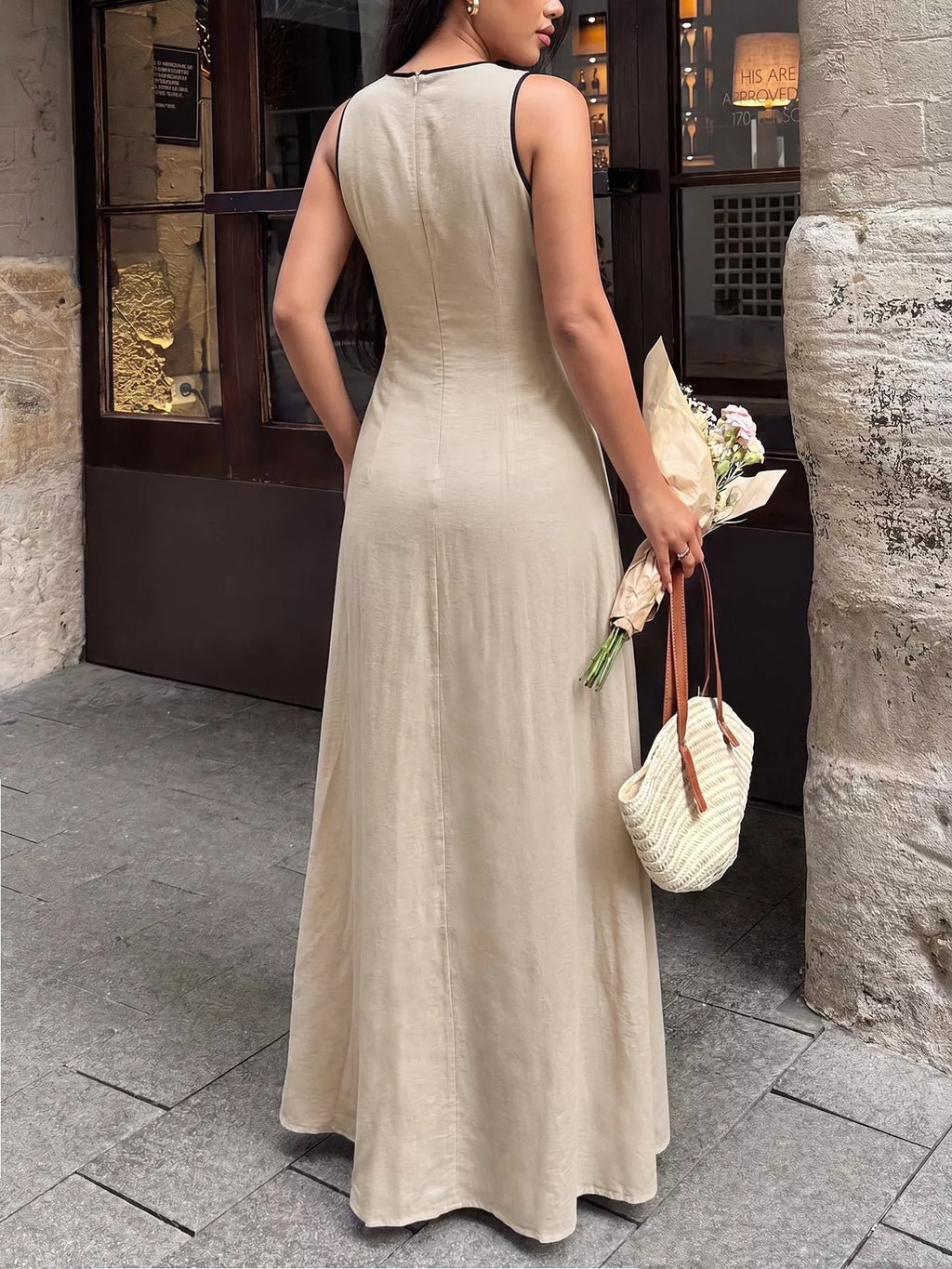 V-neck sleeveless maxi dress in tan, front view