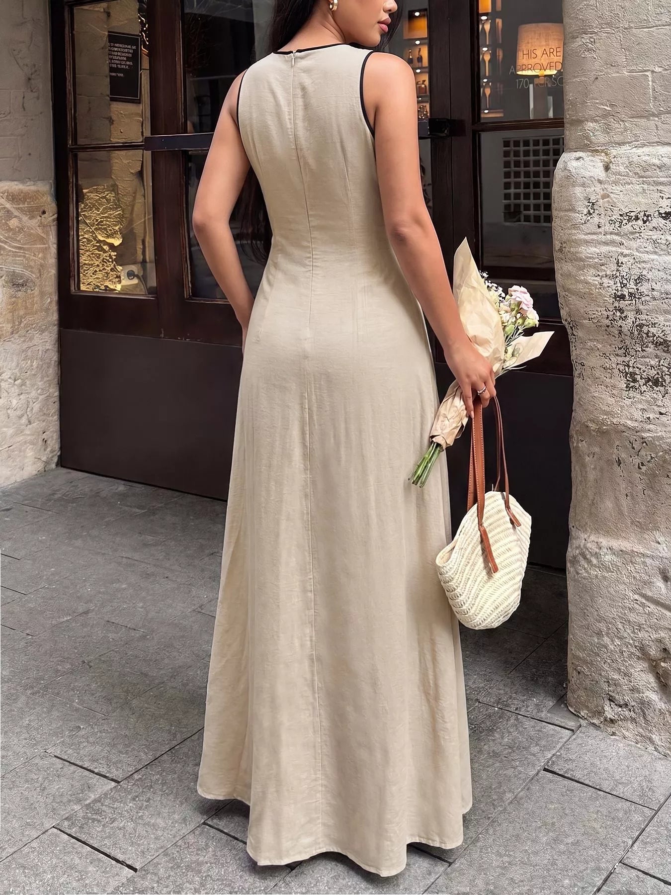 V-neck sleeveless maxi dress in tan, front view