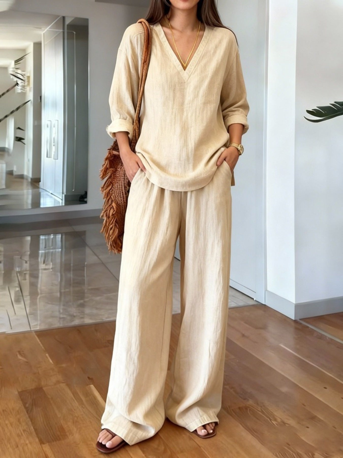 Cream white v-neck top and wide-leg pants set - front view