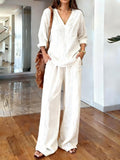White v-neck top and wide-leg pants set - front view
