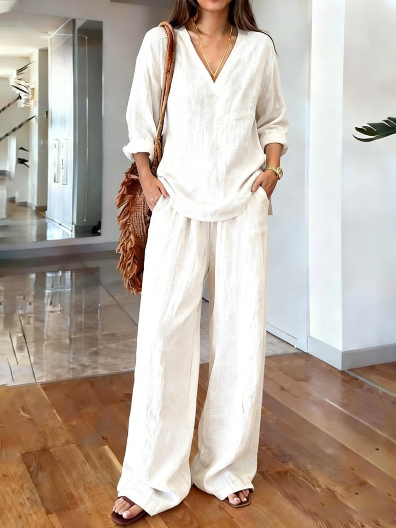 White v-neck top and wide-leg pants set - front view