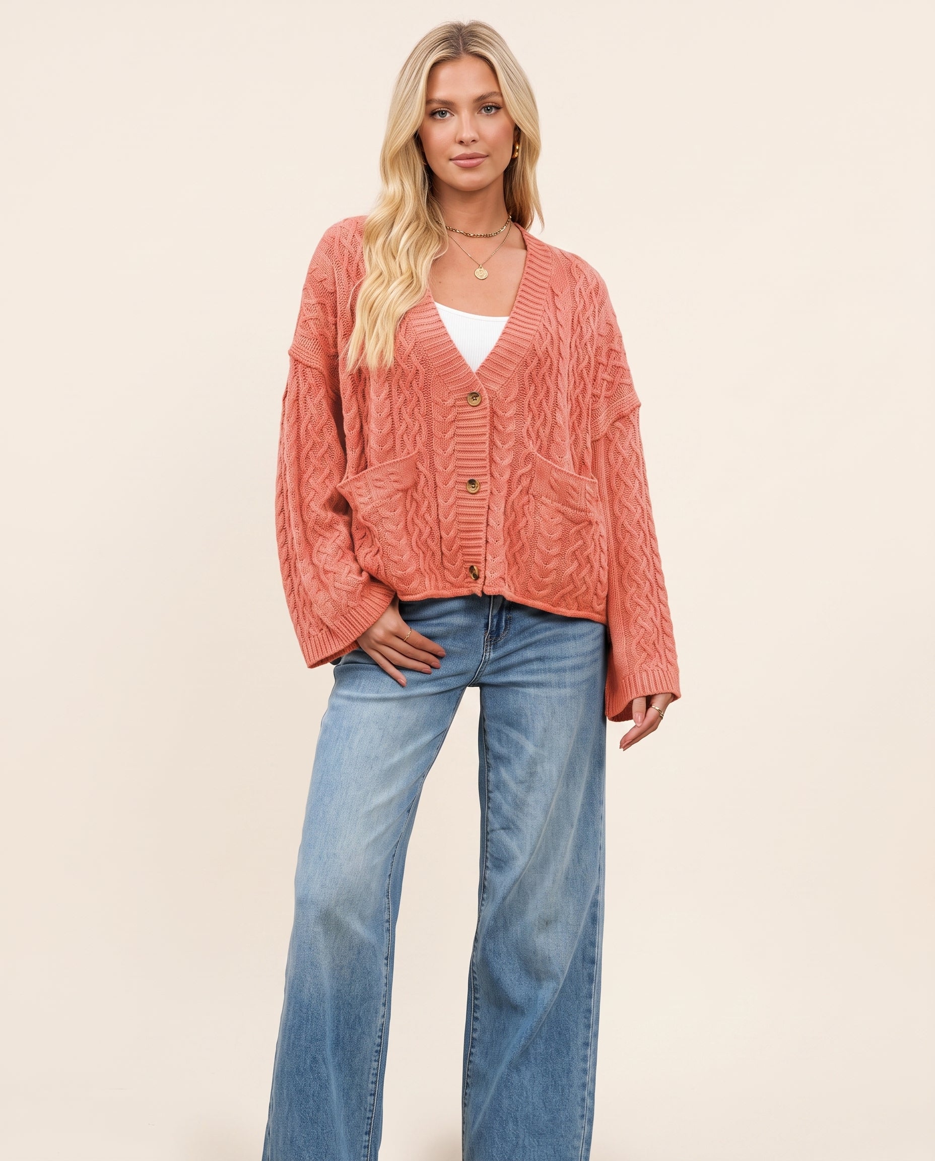 Watermelon red cable knit cardigan, front view