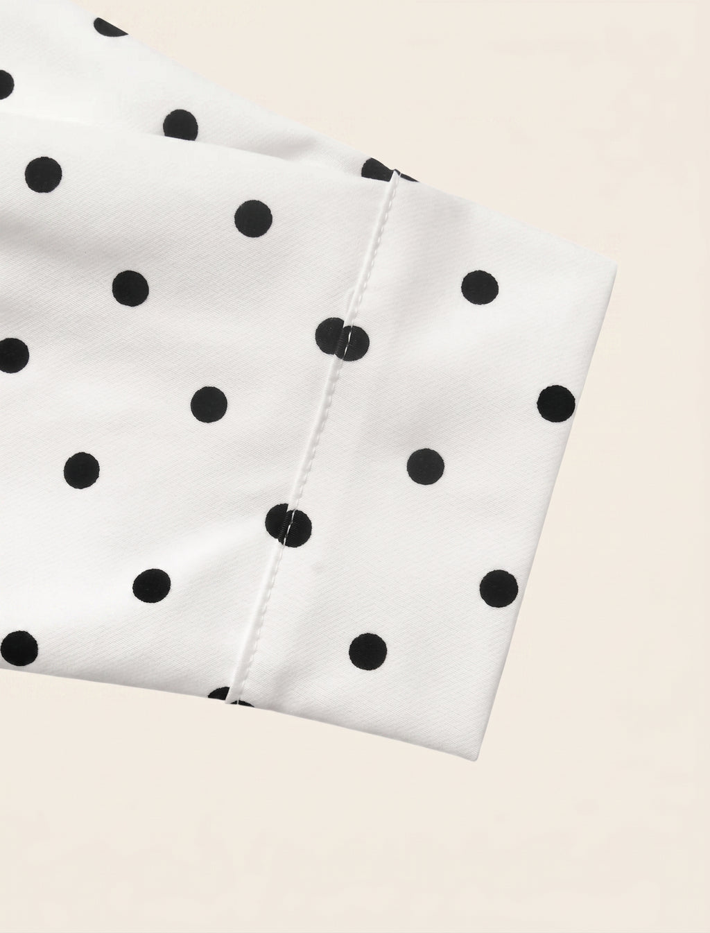 White polka dot cropped jacket, collar detail