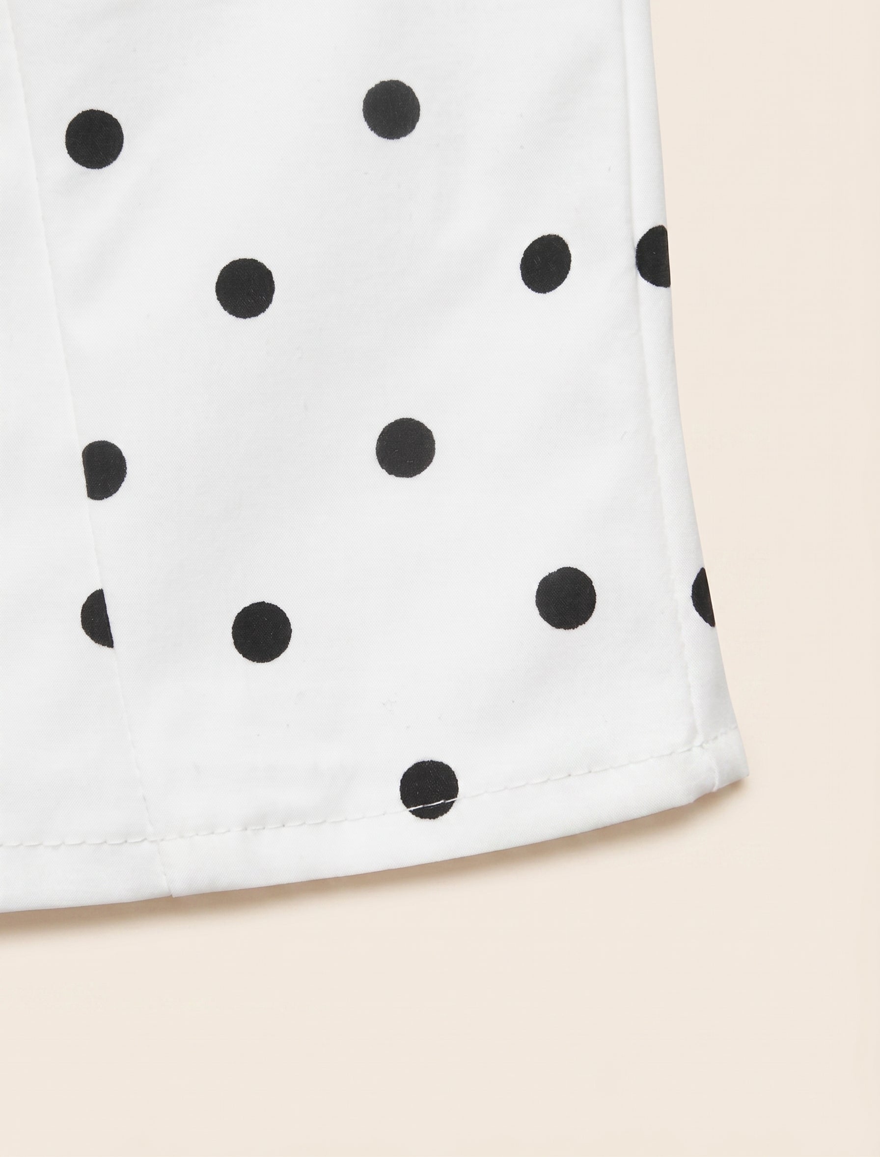 White polka dot cropped jacket, collar detail
