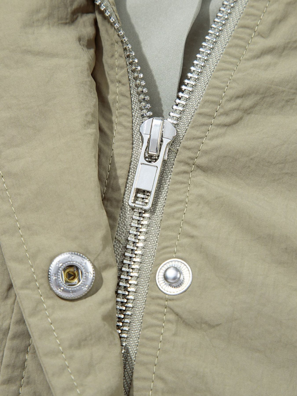 Yellow-green cropped utility jacket with hood, worn open over a tank top